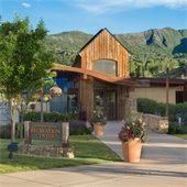 front of rec center in summer time with flowers