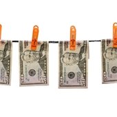 50 dollar bills on clothesline