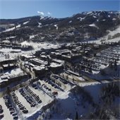 aerial photo of village lots, mall, fanny hill in the winter time